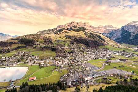 Holiday in Switzerland - Beautiful foggy view of winter landscape view of Engelberg from Mount Titlis Switzerlandの写真素材