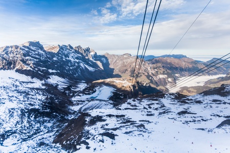 Holiday in Switzerland - Beautiful foggy view of winter landscape view of Engelberg from Mount Titlis Switzerlandの写真素材