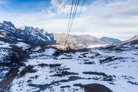 Holiday in Switzerland - Beautiful foggy view of winter landscape view of Engelberg from Mount...