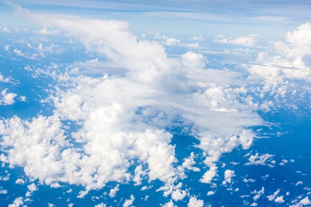 White Cloud and Blue Sky View From A Plane For Backgroundの写真素材