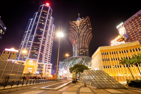 Senado, Macau - February 2, 2015: Grand Lisboa Hotel comprised of an ultramodern tower rising from a striking geodesic dome, this iconic casino hotelのeditorial素材