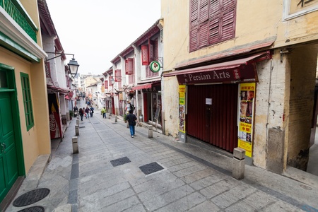 Senado, Macau - February 3, 2015: Rua da Felicidade is a street in Macau that has buildings and street painted in red and  was once the heart of Macau's red lights district.のeditorial素材