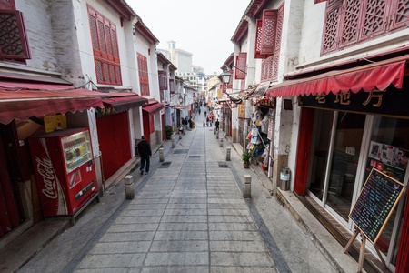 Senado, Macau - February 3, 2015: Rua da Felicidade is a street in Macau that has buildings and street painted in red and  was once the heart of Macau's red lights district.のeditorial素材