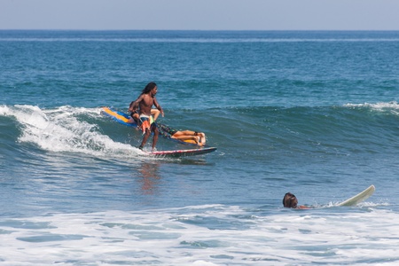 BALI, INDONESIA, 8 April 2016: Surfing in Kuta.