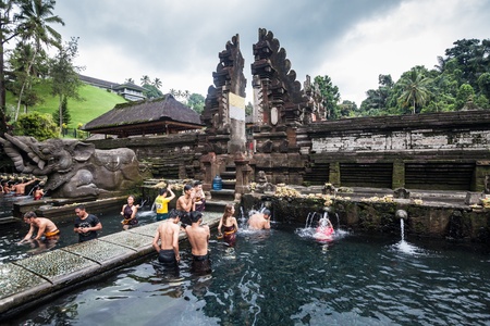 BALI, INDONESIA, April 2016: Holiday in Bali, Indonesia - Tirta Empul Holy Waterのeditorial素材