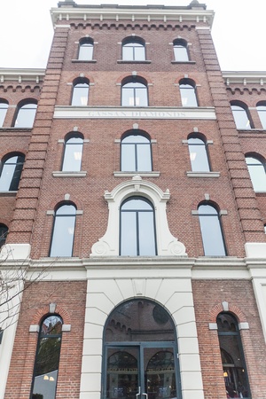 Amsterdam Holland, 4 December 2014 : Canal Cruises view of Amsterdam. Amsterdam is the Netherlandsâ capital, known for its artistic heritage, elaborate canal system and narrow houses with gabled facades, legacies of the cityâs 17th-century Golden Age.のeditorial素材