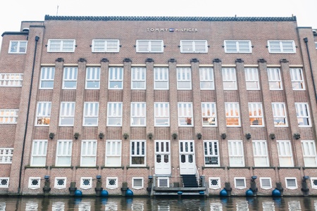 Amsterdam Holland, 4 December 2014 : Canal Cruises view of Amsterdam. Amsterdam is the Netherlandsâ capital, known for its artistic heritage, elaborate canal system and narrow houses with gabled facades, legacies of the cityâs 17th-century Golden Age.のeditorial素材
