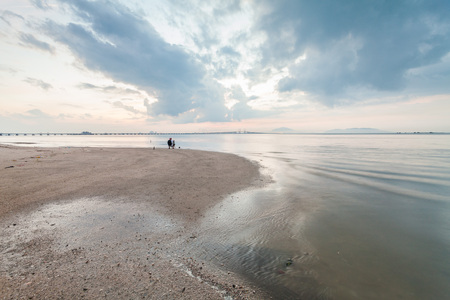 Sunrise by the shore with view of Penang Bridgeの写真素材