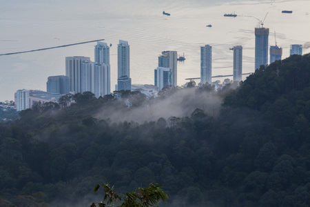 Cityscape, mountain and fog sea view for backgroundの写真素材