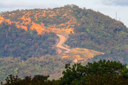 Erosion of hill indicating over developmentの写真素材