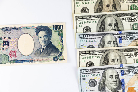 Close up view of US Dollar and Japanese Yen indicating strong currency exchange rateの写真素材