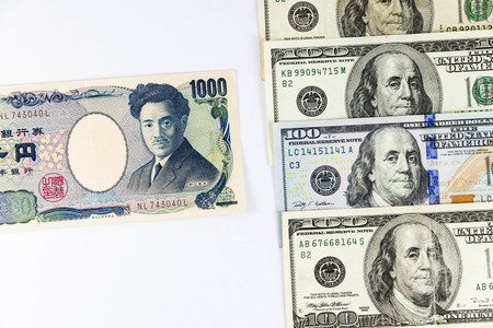 Close up view of US Dollar and Japanese Yen indicating strong currency exchange rateの写真素材