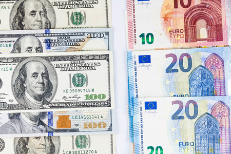 Close up view of US Dollar and Europe Euro indicating strong currency exchange rateの写真素材