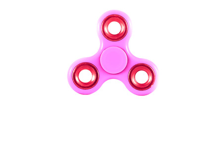Fidget Spinner in white isolated background for stress release during workの写真素材