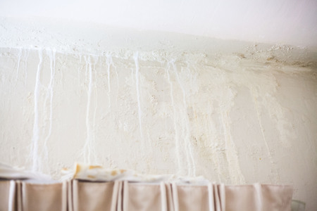 Dirt watery ceiling leaking view indicating dangerous of flood and mold growの写真素材