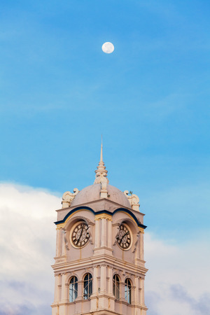 Close up view of clock tower with blue sky in George Town Penangの写真素材