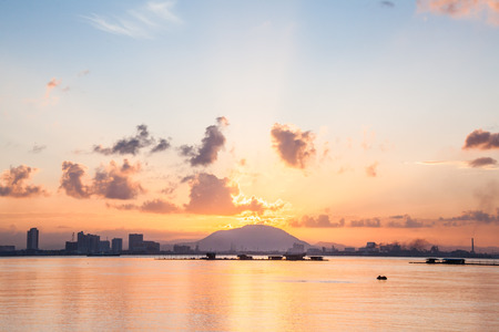 Sunrise or sunset landscape view by the hill for beautiful backgroundの写真素材
