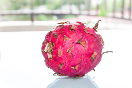 Dragon Fruit view in close up with blur isolated white backgroundの写真素材