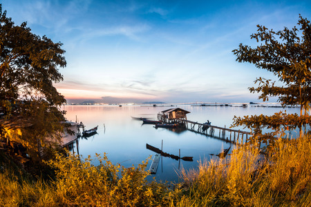 Real wooden bridge view of sunrise backgroundの写真素材