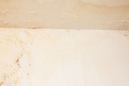Dirt watery ceiling leaking view indicating dangerous of flood and mold growの写真素材