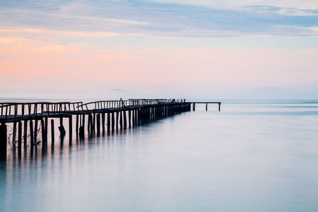 Wooden bridge sunrise view for beautiful backgroundの写真素材
