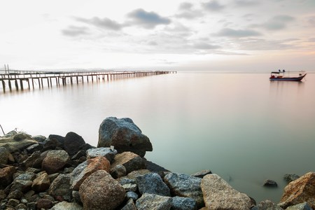 Wooden bridge sunrise view for beautiful backgroundの写真素材