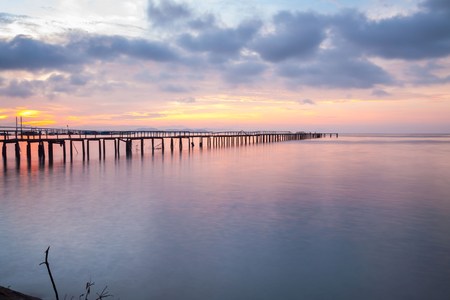 Wooden bridge sunrise view for beautiful backgroundの写真素材