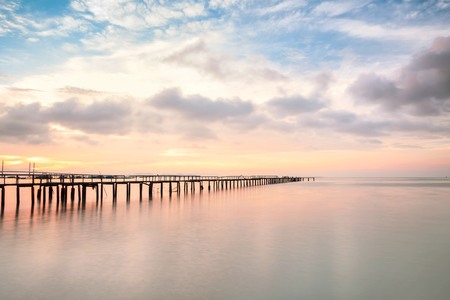 Wooden bridge sunrise view for beautiful backgroundの写真素材