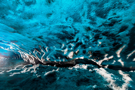 Blue ice cave view during winter in Jokulsarlon, Icelandの写真素材
