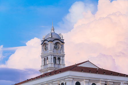 Close up view of clock tower with blue sky in George Town Penangのeditorial素材
