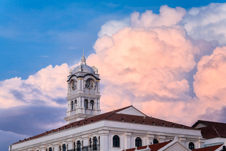 Close up view of clock tower with blue sky in George Town Penangのeditorial素材