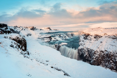 Gullfoss waterfall view in the canyon of the Hvita river during winter snow Icelandの写真素材