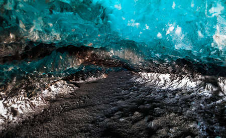 Blue ice cave view during winter in Jokulsarlon, Icelandの写真素材
