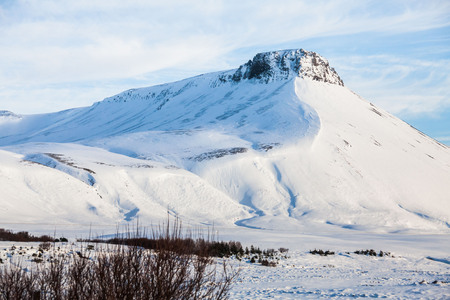 Beautiful winter snow landscape of Snaefellsnesvegur near Kirkjufellの写真素材