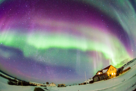 Aurora Borealis or better known as The Northern Lights for background view in Iceland, Snaefellsnesvegur during winterの写真素材