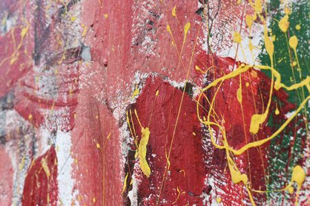 Paint drops wall texture background red white yellow green blank right focus blurの写真素材