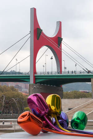 Bilbao, Euskal Herria, Spain - 09 05 2018: Jeff Koons stainless steel colorful tulips at Bilbao...