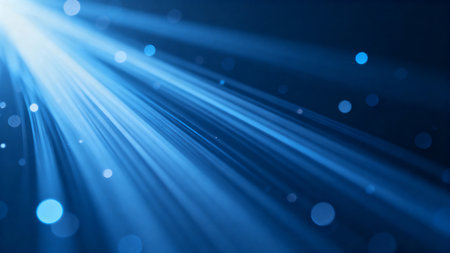 Blue light rays and glowing particlesの素材