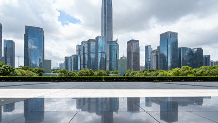 Modern city skyline with reflective plazaの素材