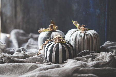 Halloween pumpkins on rustic background, selective focus.の写真素材