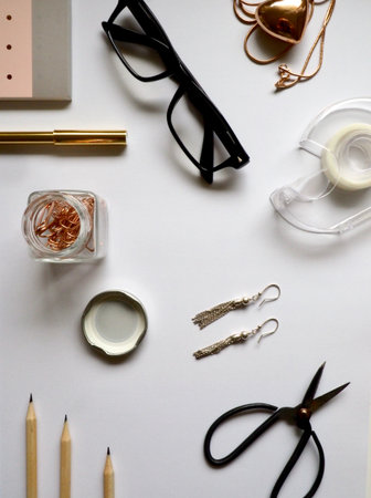 Flat lay of female accessories on white background with copy space.の写真素材