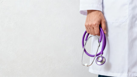 Doctor holding stethoscopeの素材