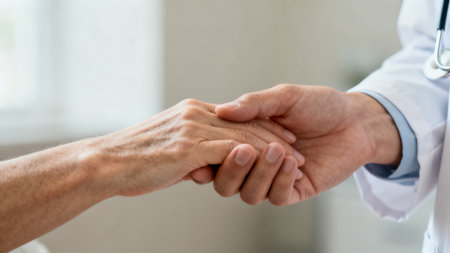 doctor holding patient handの素材
