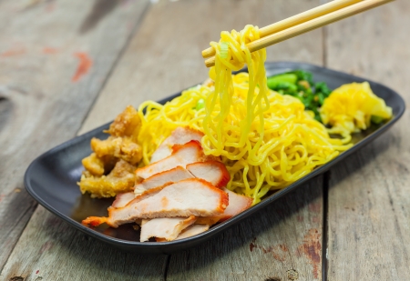 Chinese noodles with roast pork and vegetable.の写真素材