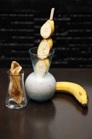 Banana smoothie with banana crispy.の写真素材