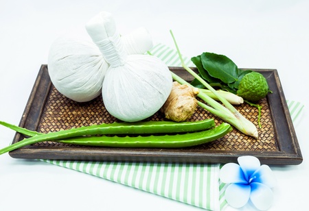 Spa massage  with thai herbal compress の写真素材