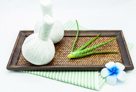 Spa massage  with thai herbal compress の写真素材
