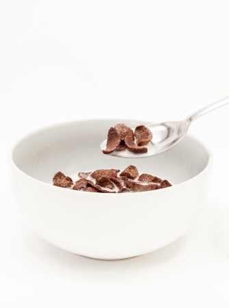 Chocolate cereals with milk isolate on white  の写真素材