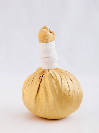 Herbal compress balls for spa treatment の写真素材