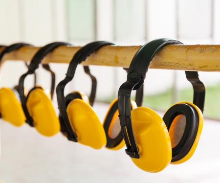 The yellow protective earmuffs for shooting  